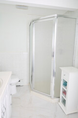 Modern white bathroom interior. Interior design photograph.