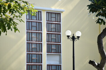 old vintage windows building with lamppost street