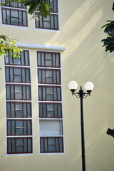 old vintage windows building with lamppost street