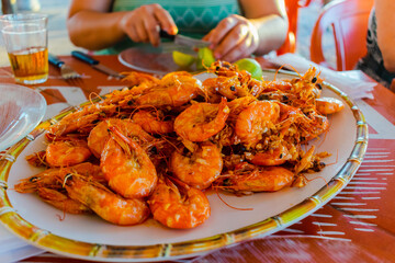 Fried shrimp with lemon at market fish in Fortaleza, Ceara, Brazil.