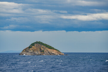 Cloudy summer landscape near Elba Island, Italy, Europe