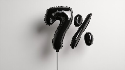 Black balloons forming seven percent symbol on white background