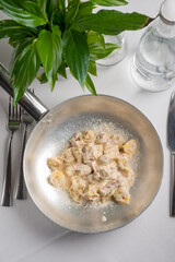 tortellini with parmesan cheese , traditional italian recipe