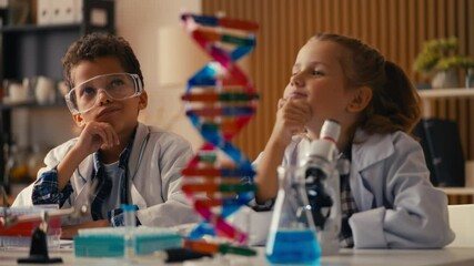 Two funny kids in lab coats thinking about research, having a brilliant idea - Powered by Adobe