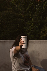 person sitting on a bench in the park