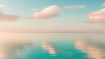 A calm and peaceful sea with turquoise moving waters reflecting a warm pastel sky at sunrise or sunset, with hints of peach, pink and blue.