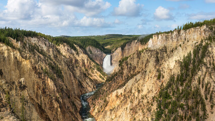 Yellowstone National Park sunrise at Artist Point Overlook with view of Lower Falls at Grand Canyon of the Yellowstone River 