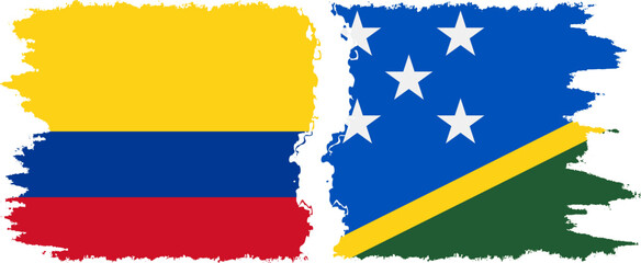 Solomon Islands and Colombia grunge flags connection, vector