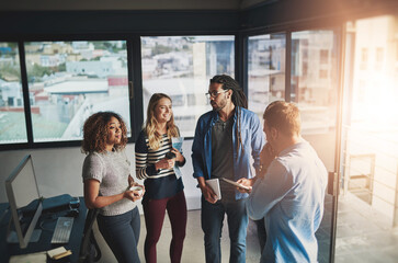 Designer, collaboration and teamwork with business people in office for planning, support or diversity. Lens flare, creative and entrepreneur with group of employee in startup for project management