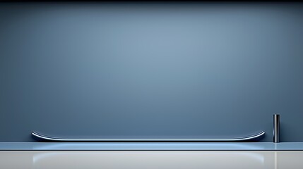 Silver object is on a white background. The background is blue and the silver object is on the right side of the background