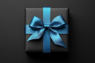 Elegant black gift box with a shiny blue ribbon presented on a minimalist dark background