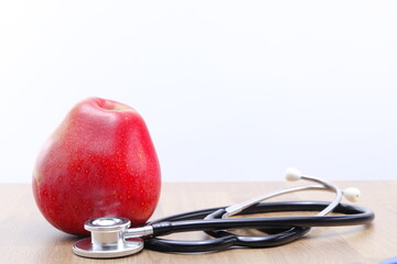 Apple as a symbol of taking care of your health, regular check-ups and taking care of yourself and your health