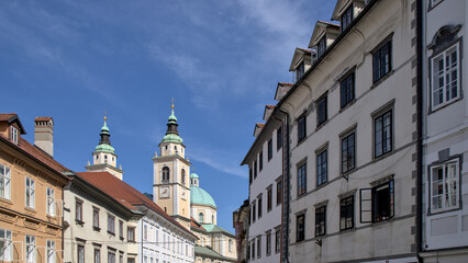 colorful buildings in downtown ljubljana slovenia city center (beautiful european architecture in historic town) europe travel tourism destination balkans julian alps adriatic mediterranean