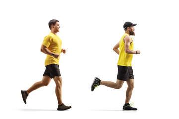 Full length profile shot of two men running in a row