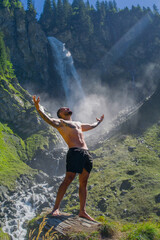 Meditation. Harmony and peace in nature. Calm athlete man meditating in environment. Mindfulness. Relaxed man in nature. Freedom and happiness. Muscular fit man practicing yoga outdoors.