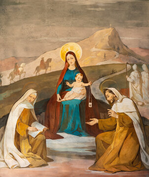 ALESSANDRIA, ITALY - SEPTEMBER 10, 2024: The fresco Madonna with the St. Thresa of Avila and St. Simon Stock in the church Chiesa di Santa Maria del Carmine by Pietro Dalle Ceste (1963).