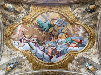 ASTI, ITALY - SEPTEMBER 11, 2024: The ceiling fresco of apostles Andrew, Peter, John with the...