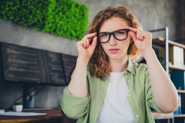 Portrait of young girl computer it specialist touch glasses think wear shirt workplace office...
