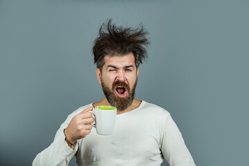 Good morning. Funny crazy Man awake in morning. Portrait of man with messy hair. Morning wellness. Morning routine for guy.