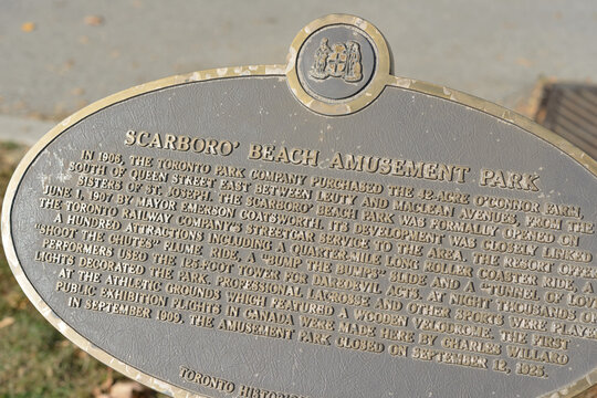 detail of Toronto Heritage plaque with inscription for Scarboro Beach Amusement Park (1907-1925) once located at the Beach neighbourhood south of Queen Street East between Leuty and Maclean Avenues