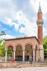 Fototapeta premium Burmese Masjid (Burmalı Masjid Mosque) located in the outer courtyard of Şehzade Mosque in Istanbul.