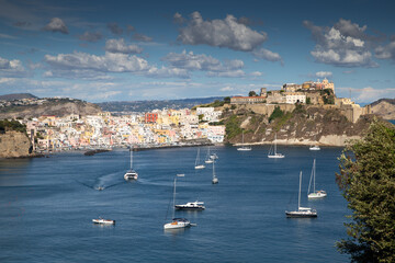 beautiful Procida island with colorful houses in sunny summer day, Italy
