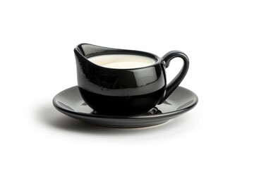 A cup of milk sitting on a saucer