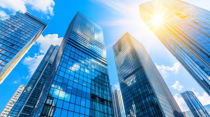 Modern office building with mirror glass panels and vibrant blue sky