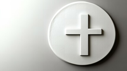 Obraz premium White cross on a round plaque against a white background.