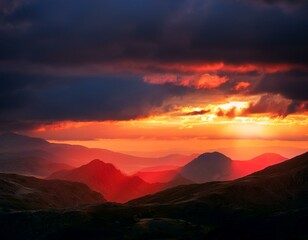 the red sunset shines through between the mountains and dark clouds