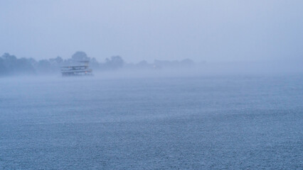 Heavy rain on the Zambezi River, Livingstone, Zambia