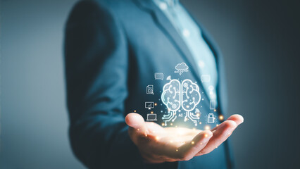 Concept of artificial intelligence and futuristic digital technology. Businessman's hand show...