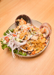 Fish ceviche and rice with seafood, traditional Peruvian dish of fish and seafood
