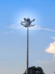spotlight pole with blue sky and copy space