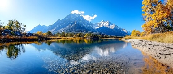 Fototapeta premium Breathtaking winter landscape featuring snow capped mountains majestically reflected in the still tranquil waters of a serene alpine lake
