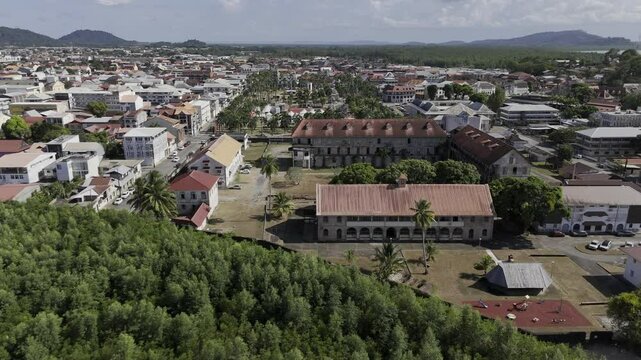 Drone flies over Jean Martial Hospital and over Place des Palmistes in Cayenne, French Guiana, France
