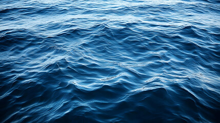 Aerial View of Rippling Waves on a Vibrant Blue Sea Surface