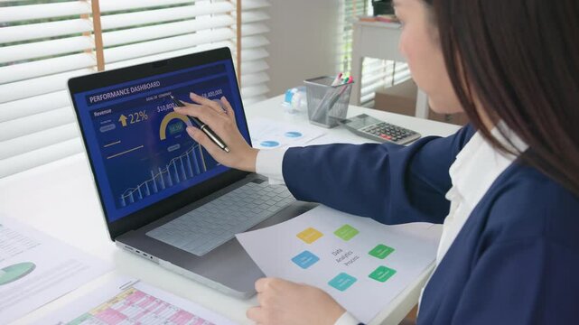 Asia people expert woman AI deep tech talent working on project predict sales insight SEO graph chart plan visual big data science report center BI smart tools screen. Office worker asian analyst job.