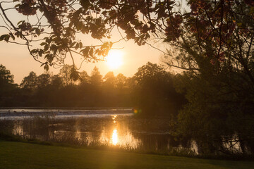 Obraz premium Sunset over a Lake in the UK.