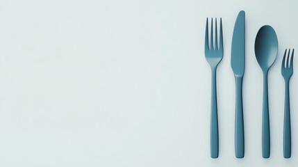 Elegant cutlery set including fork, knife, and spoon on a minimalist light background, perfect for dining or culinary themes.