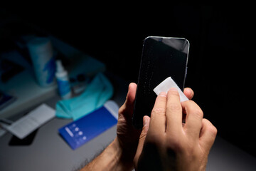 Properly Cleaning Your Smartphone Screen Thoroughly with a Soft Cloth for Best Results