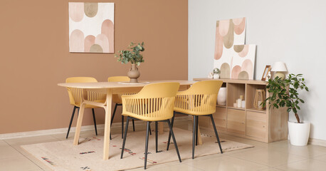 Dining table with chairs in modern room