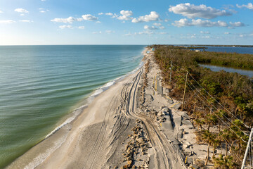 Hurricane Milton storm surge destroyed Manasota Key road at Blind Pass Beach. Severe damage to...