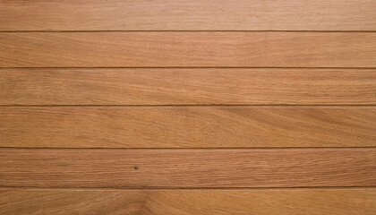 Obraz premium Wooden plank surface with natural grain and warm brown tones, creating a rustic backdrop.