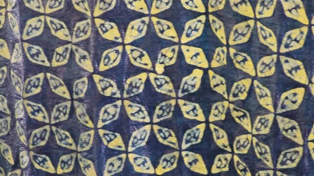 How to dye indigo fabric with wax painting