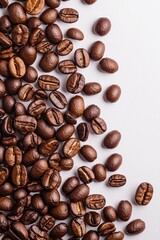 Obraz premium Rich Aroma Close-up Brown Coffee Beans on White Surface - Warm and Inviting Mood for Food Marketing