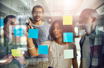 Business people, writing or meeting with glass board for reminder, schedule planning or...