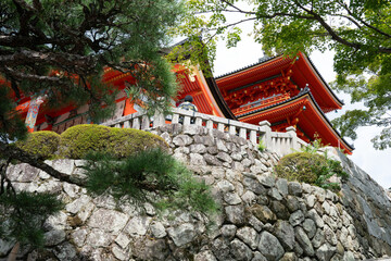 Serene Japanese Temple Surrounded by Lush Gardens and Traditional Architecture, Capturing the Tranquil Beauty and Spiritual Essence of Japan's Sacred Sites