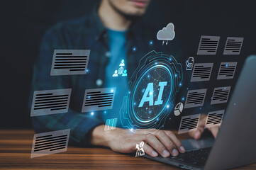 Businessman using AI software to automate repetitive tasks, allowing more focus on innovation and strategic planning.