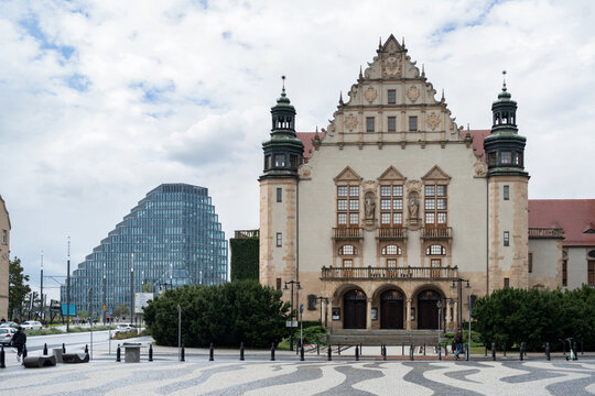 Adam Mickiewicz University in Poznań. Aula Uniwersytecka UAM concert hall at the Uniwersytet im. Adama Mickiewicza w Poznaniu. Bałtyk office building in background on October 3, 2024 in Poznan, Poland